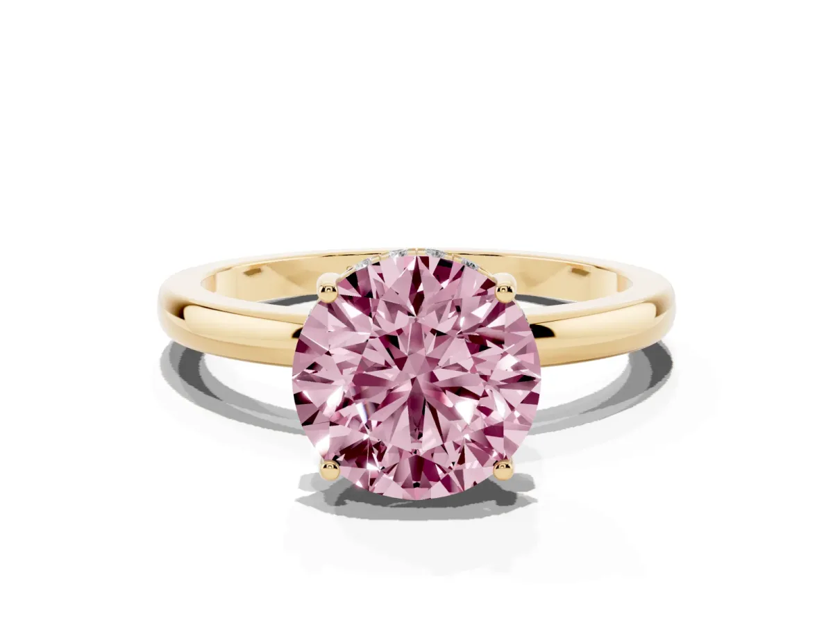 Fancy Pink Round Cut Solitaire Diamond Ring with Prong Setting and Plain Band Yellow gold