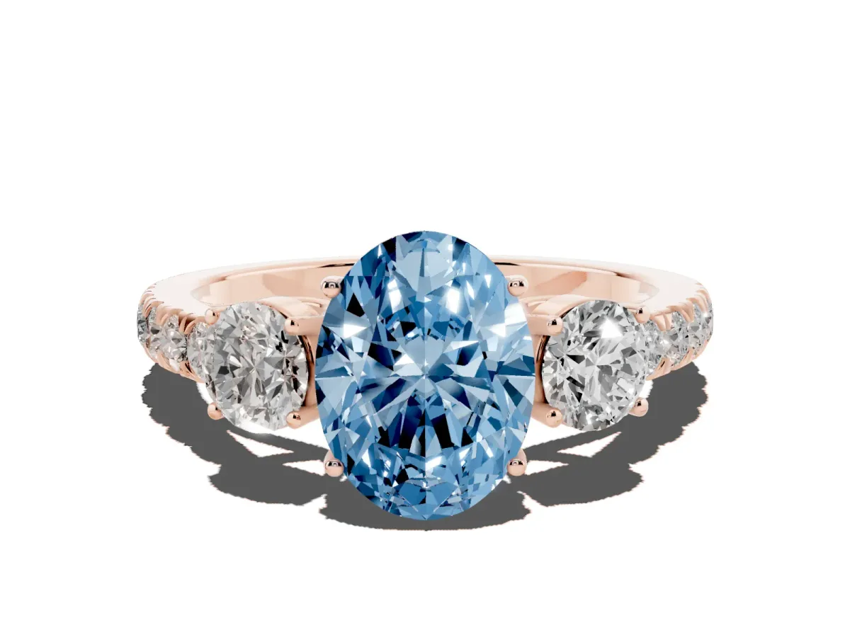Fancy Blue Oval Cut Cut Diamond Three-Stone Ring with Round Side Stones and Pavé Band Rose gold