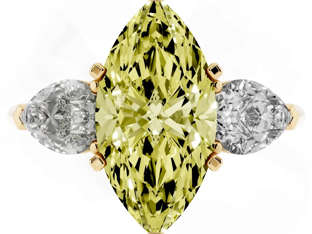 Fancy Yellow Three-Stone Marquise Cut Diamond Ring with Pear Side Stones and Four-Prong Setting Yellow gold
