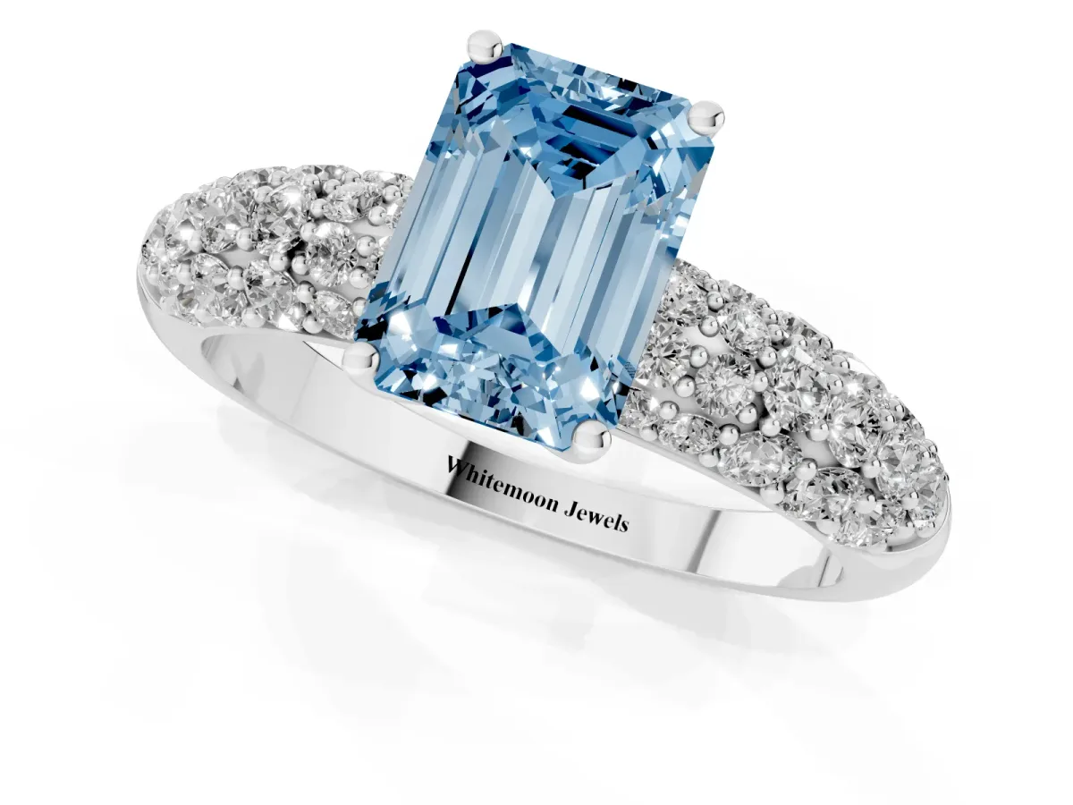 Fancy Blue Emerald Cut Diamond Pavé Band Solitaire Ring with Four-Prong Setting Silver