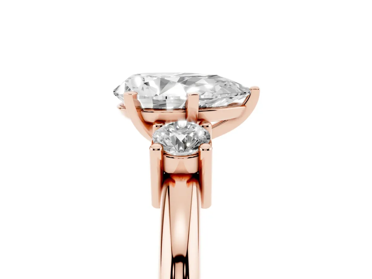 Three-Stone Pear Cut Cut Diamond Solitaire with Prong Setting and Classic Band Rose gold