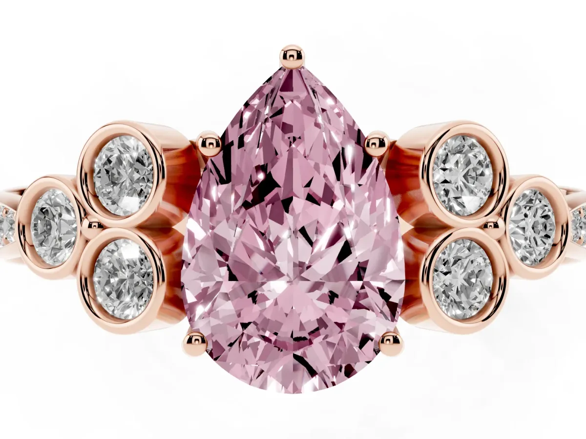 Fancy Pink Pear Cut Cut Diamond Engagement Ring with Bezel Set Round Side Stones and Prong Setting Rose gold