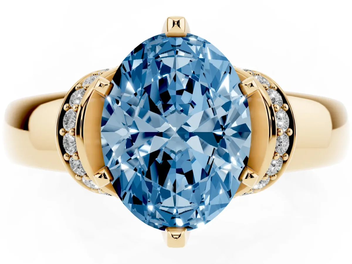 Fancy Blue Oval Cut Solitaire Diamond Ring with Pave Band and Six-Prong Setting Yellow gold