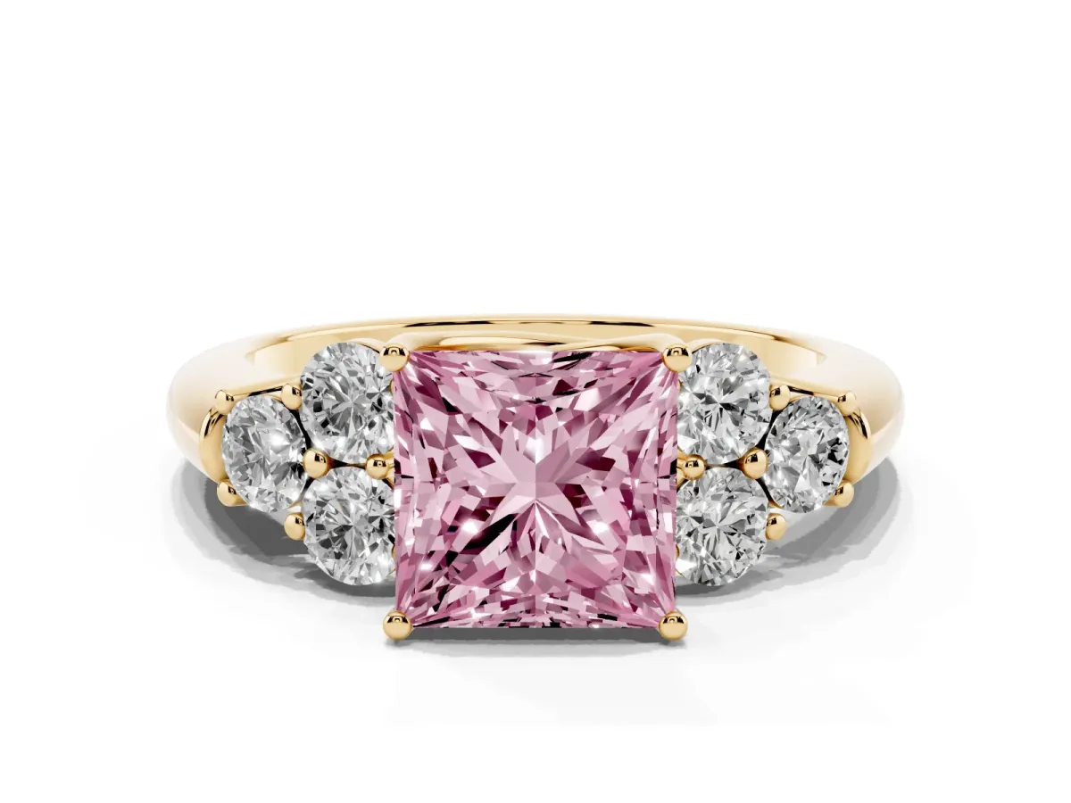 Fancy Pink Princess Cut Cut Diamond Cluster Ring with Round Accent Stones and Prong Setting on a Classic Band Yellow gold