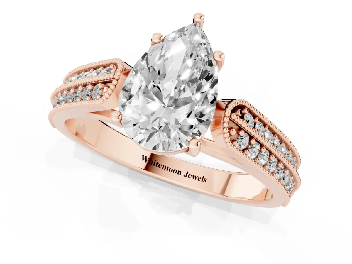 Pear Cut Cut Pave Split Shank Engagement Ring with Four-Prong Setting Rose gold