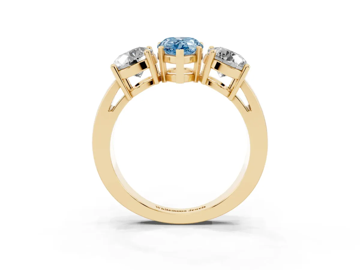 Fancy Blue Three-Stone Pear Cut Diamond Ring with Round Side Stones, Classic Band, and Four-Prong Setting Yellow gold