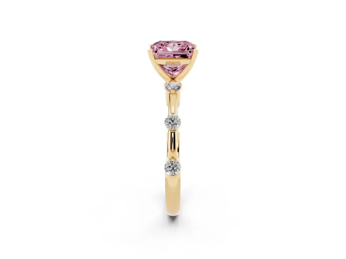 Fancy Pink Princess Cut Solitaire Diamond Ring with Bezel Set Side Stones and Prong Setting Yellow gold