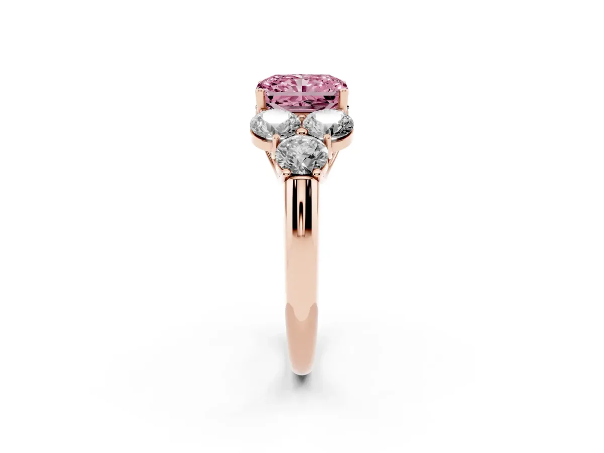 Fancy Pink Radiant Cut Cut Diamond Cluster Ring with Round Accent Stones and Prong Setting on a Classic Band Rose gold