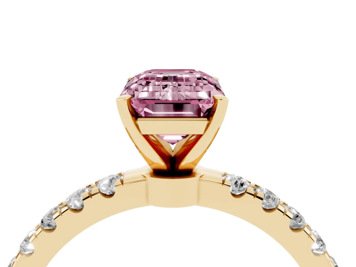 Fancy Pink Emerald Cut Diamond Solitaire Ring with Pavé Accents and Four-Prong Setting Yellow gold