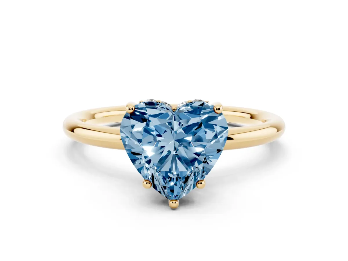 Fancy Blue Heart Cut Solitaire Diamond Ring with a Classic Band and Four-Prong Setting Yellow gold