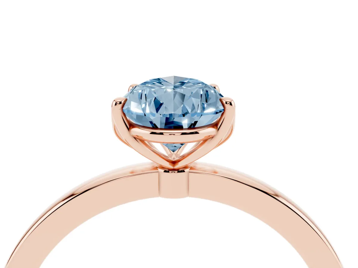 Fancy Blue Pear Cut Diamond Solitaire Ring with Thin Band and Prong Setting Rose gold