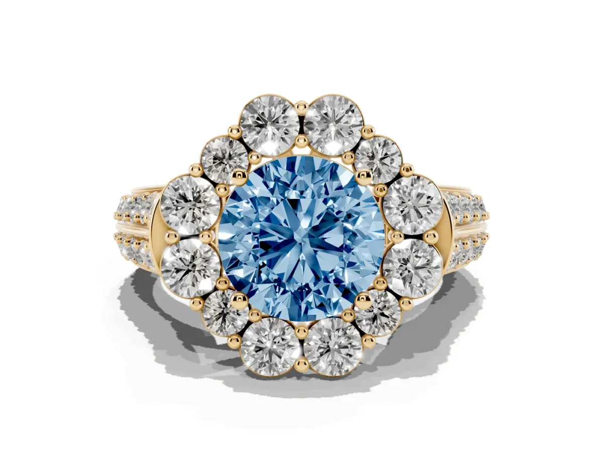 Fancy Blue Round Cut Halo Diamond Engagement Ring with Split Shank and Prong Setting Yellow gold
