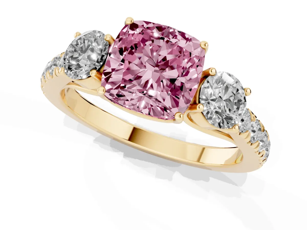 Fancy Pink Cushion Cut Cut Diamond Three-Stone Ring with Round Side Stones and Pavé Band Yellow gold