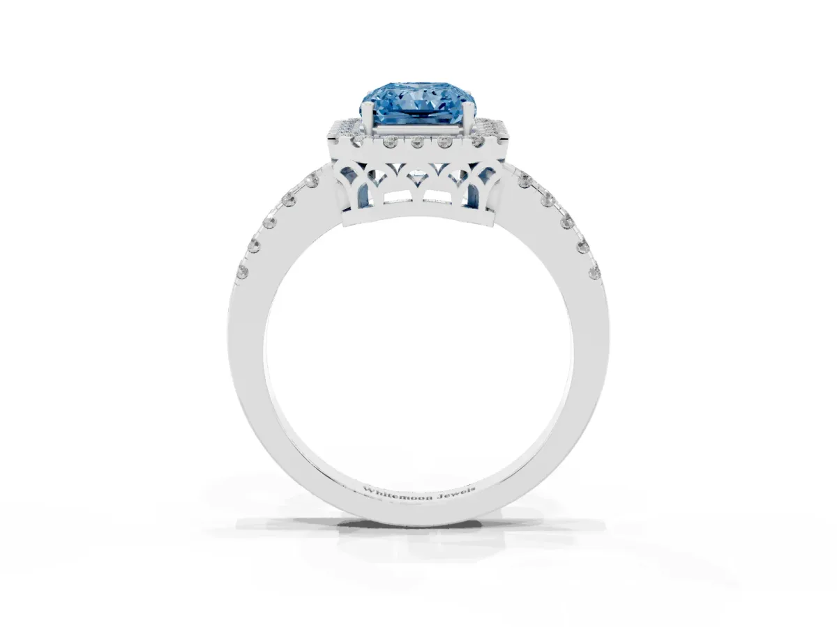 Fancy Blue Radiant Cut Halo Diamond Engagement Ring with Pavé Band and Four-Prong Setting Silver