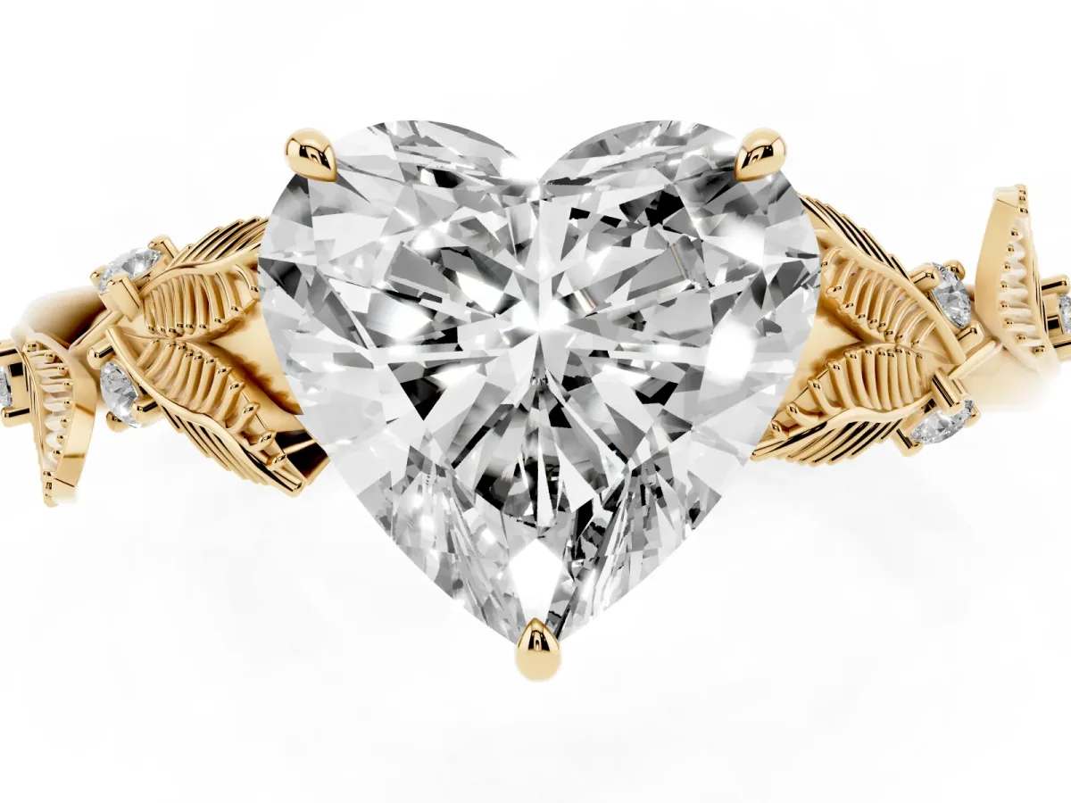 Heart Cut Diamond Solitaire Ring with Leaf Motif Band and Four-Prong Setting Yellow gold