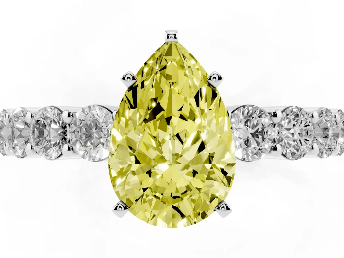 Fancy Yellow Pear Cut Diamond Solitaire Ring with Shared Prong Round Side Stones Silver