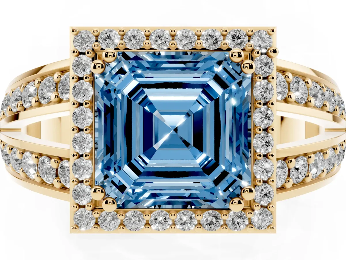 Fancy Blue Asscher Cut Diamond Halo Ring with Split Shank Pavé Band and Four-Prong Setting Yellow gold