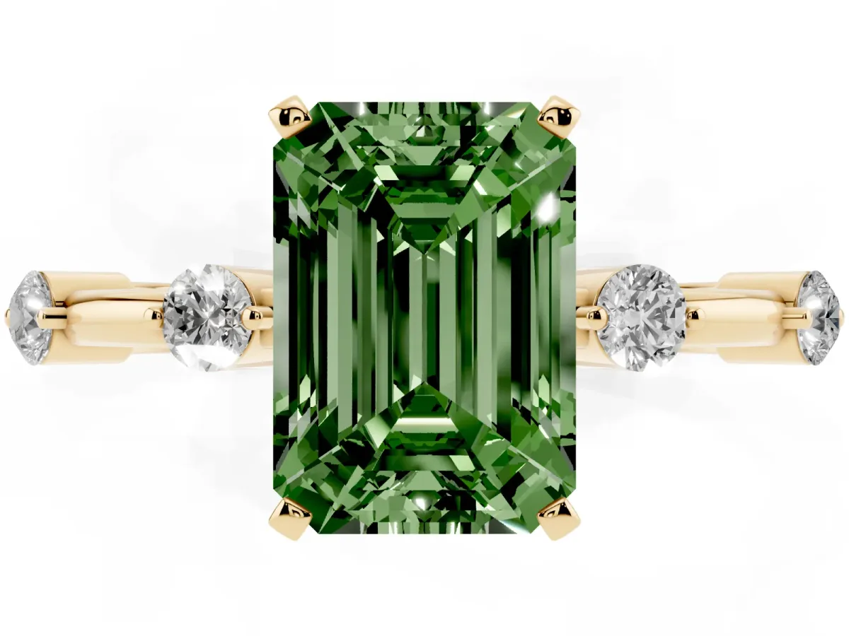 Fancy Green Emerald Cut Solitaire Diamond Ring with Bezel Set Side Stones and Prong Setting Yellow gold