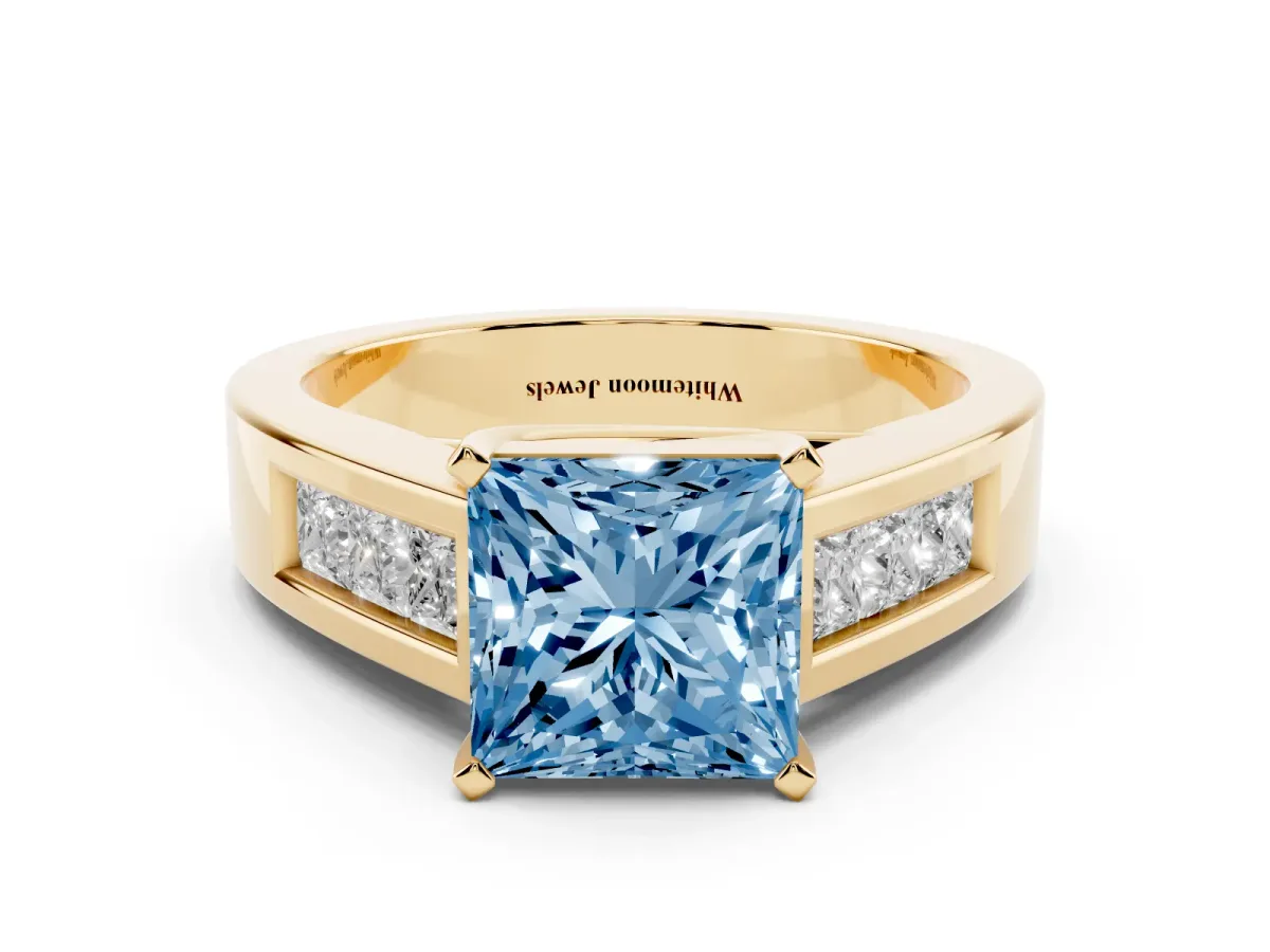 Fancy Blue Princess Cut Cut Channel Set Solitaire Ring with Four-Prong Setting Yellow gold