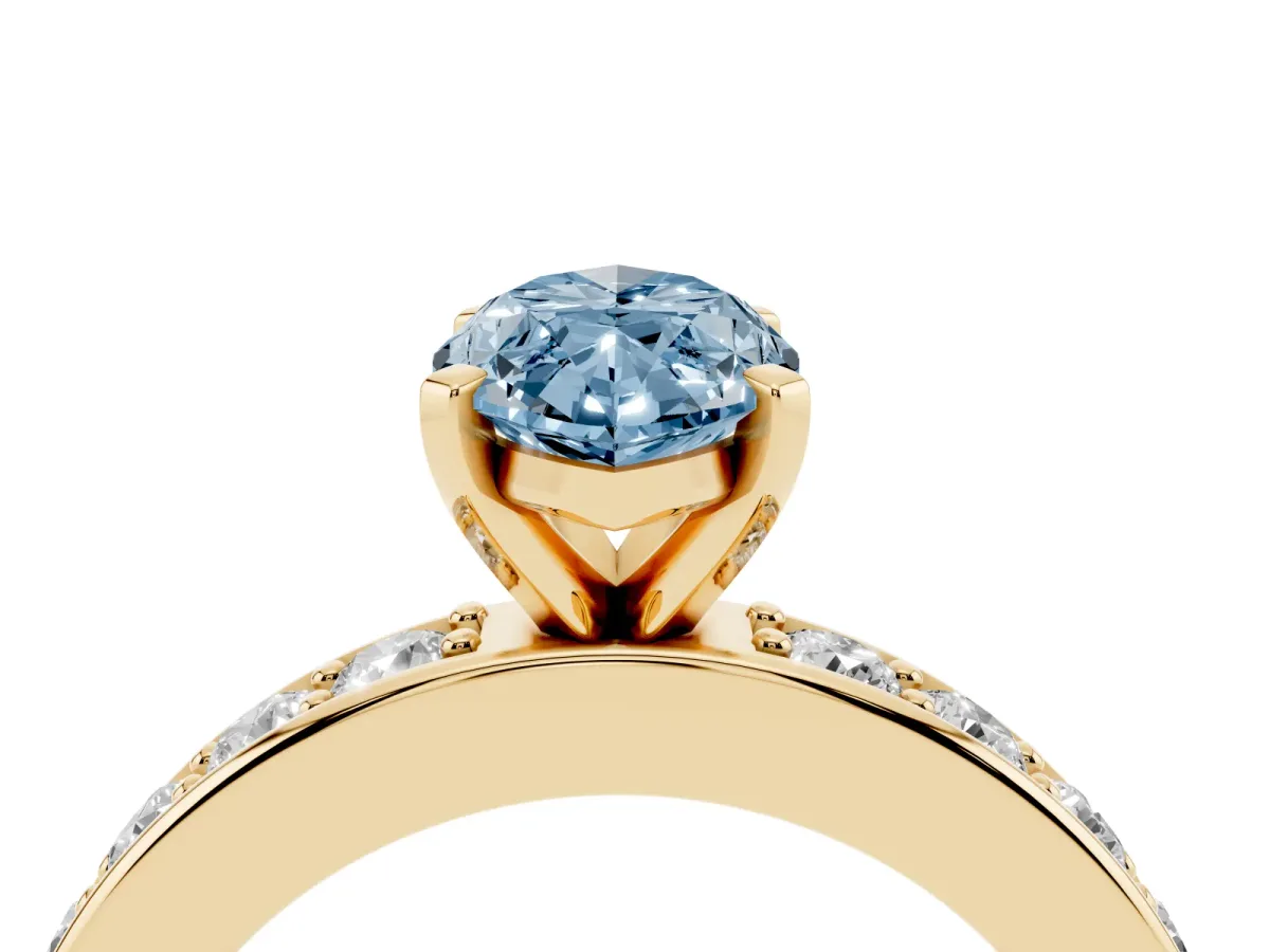 Fancy Blue Marquise Cut Diamond Engagement Ring with Channel Set Round Band and Prong Setting Yellow gold