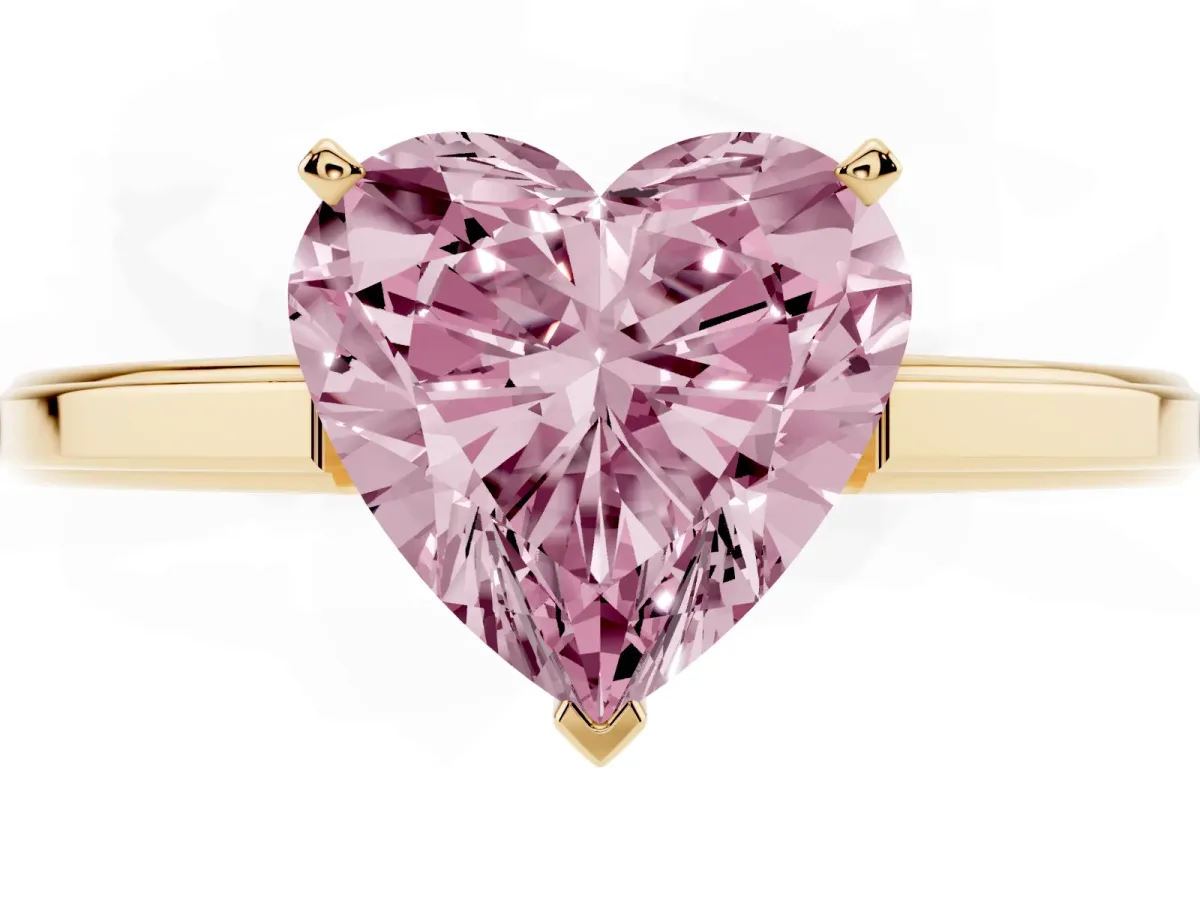 Fancy Pink Heart Cut Solitaire Diamond Ring with Four-Prong Setting and Classic Band Yellow gold