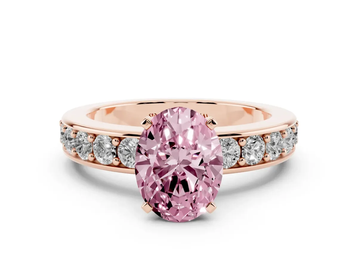 Fancy Pink Oval Cut Diamond Engagement Ring with Channel Set Round Band and Prong Setting Rose gold