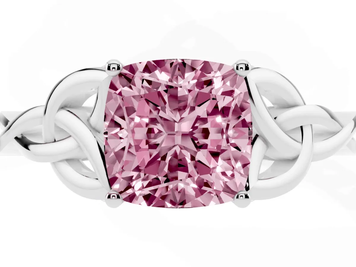 Fancy Pink Cushion Cut Diamond Solitaire Engagement Ring with Celtic Knot Band and Four-Prong Setting Platinum