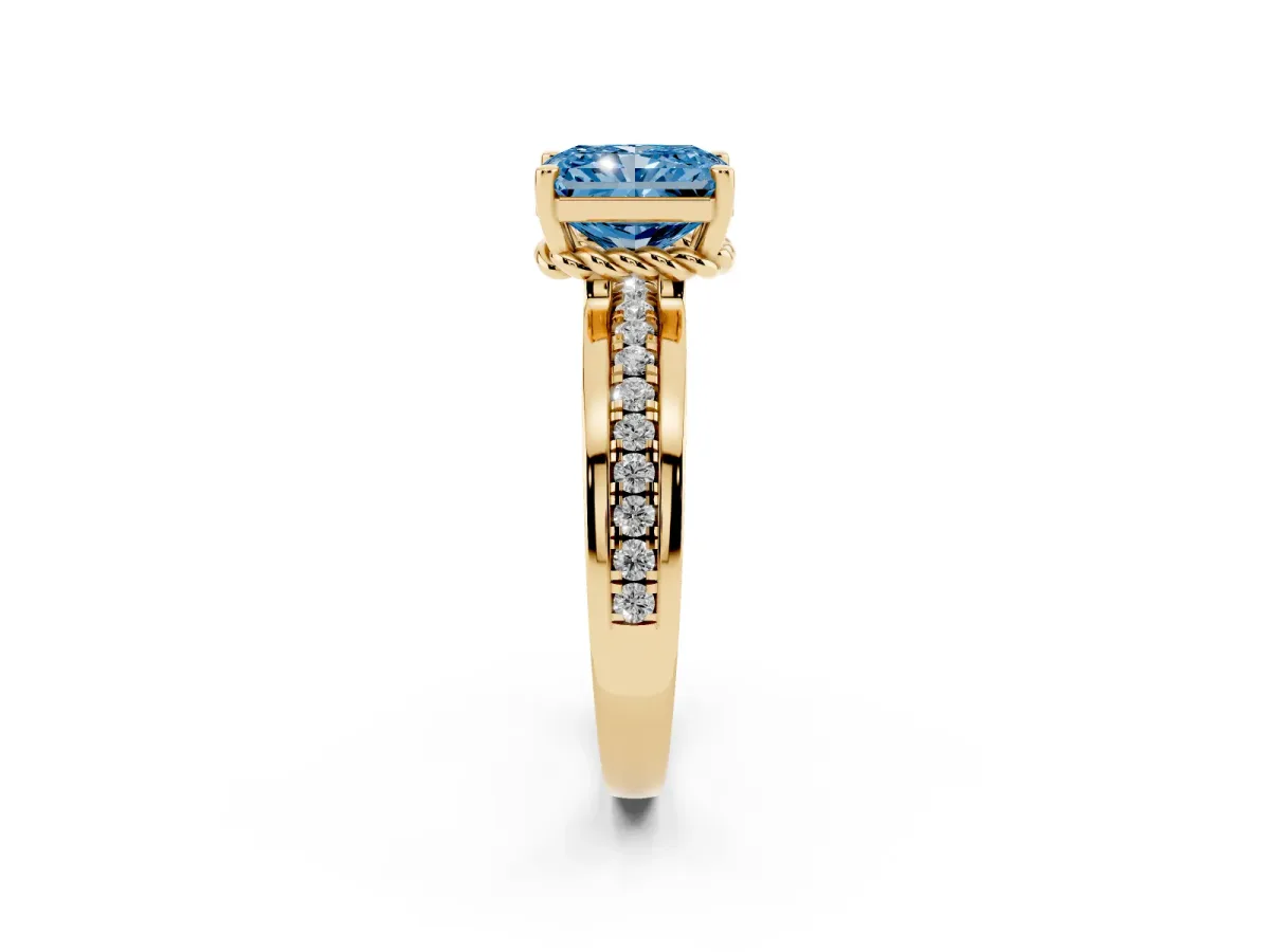 Fancy Blue Radiant Cut Solitaire Diamond Ring with Channel Set Band and Six-Prong Setting Yellow gold