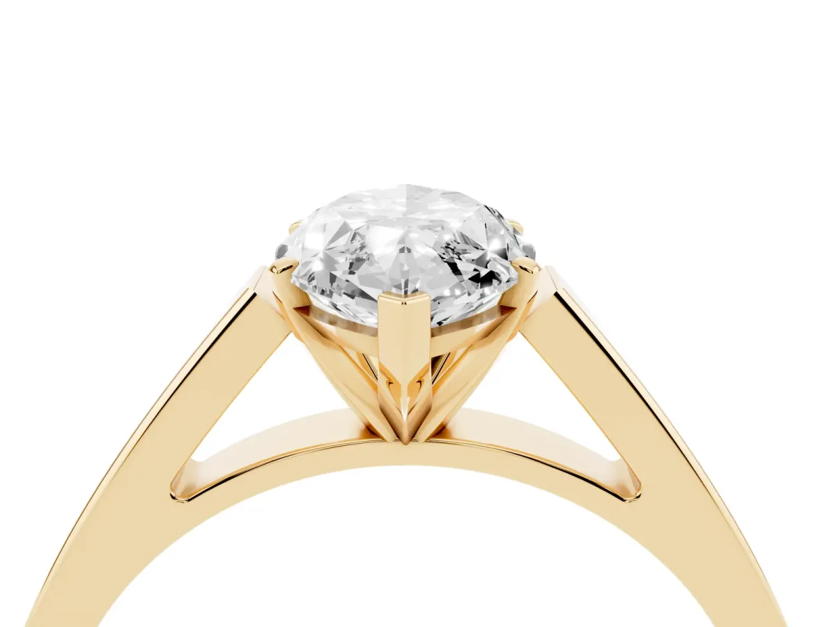 Marquise Cut Solitaire Engagement Ring with Four-Prong Setting and Tapered Band Yellow gold