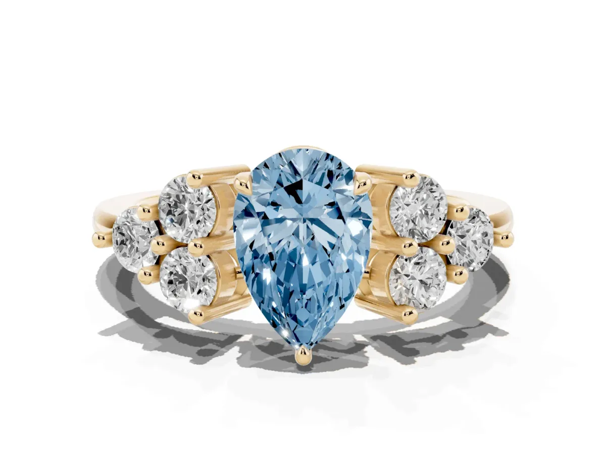 Fancy Blue Pear Cut Brilliant Diamond Cluster Accent Solitaire Ring with Prong Setting Yellow gold