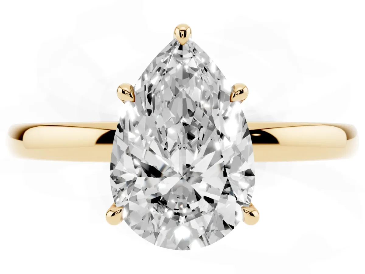 Pear Cut Solitaire Engagement Ring with Cathedral Band and Four-Prong Setting Yellow gold