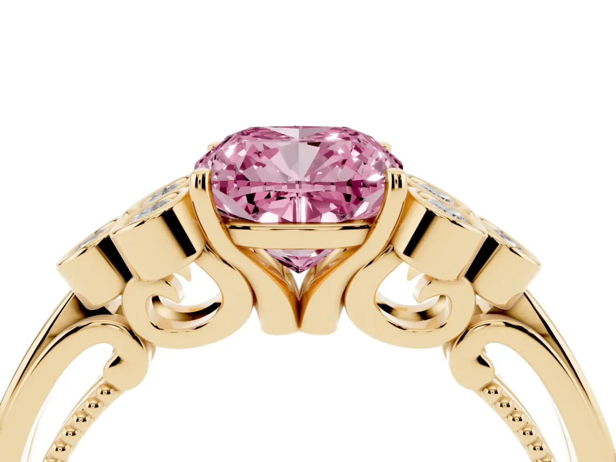 Fancy Pink Cushion Cut Cut Diamond Engagement Ring with Bezel Set Round Side Stones and Prong Setting Yellow gold