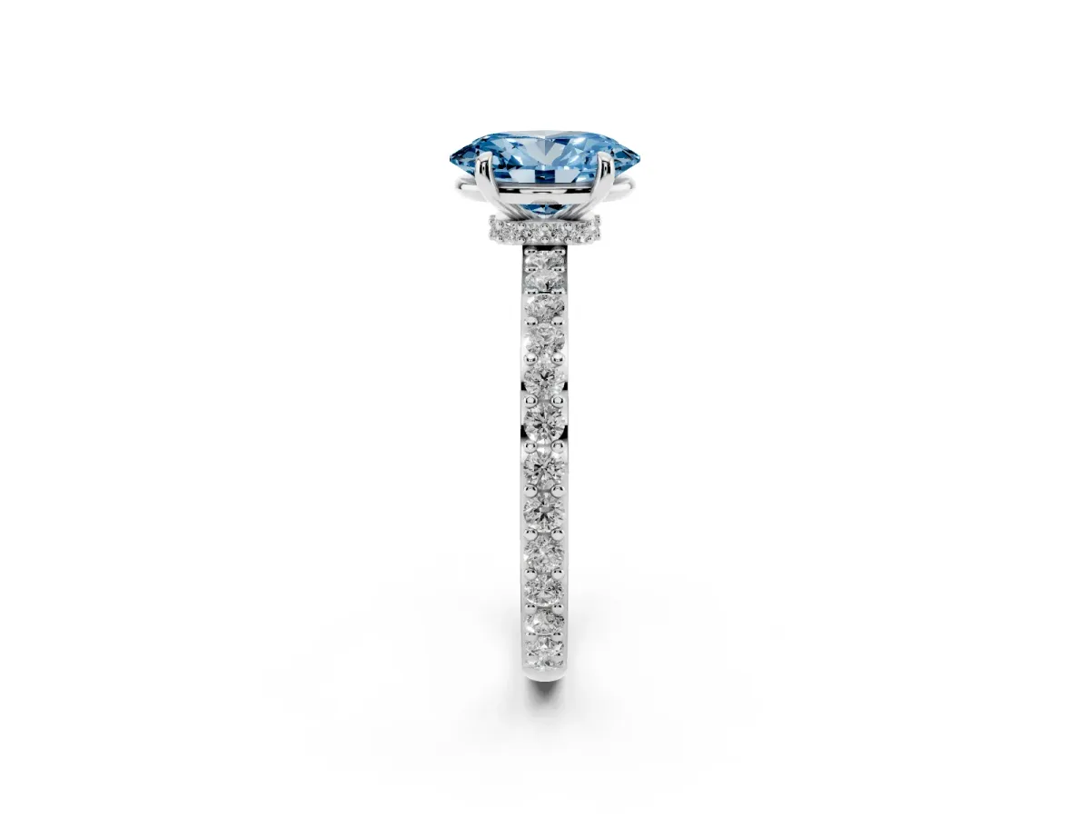 Fancy Blue Oval Cut Diamond Pavé Engagement Ring with Round Accents and Prong Setting Platinum