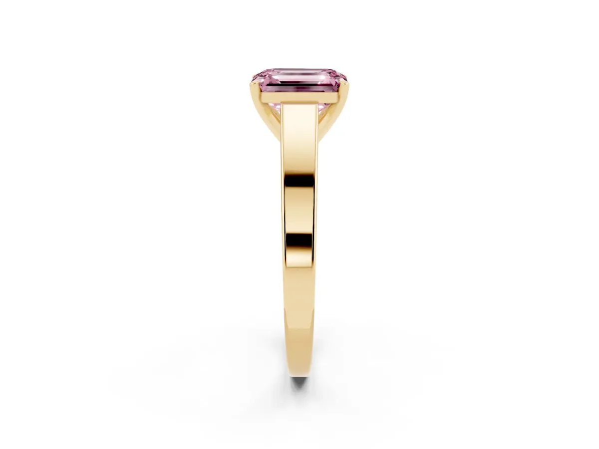 Fancy Pink Emerald Cut Solitaire Engagement Ring with Four-Prong Setting and Tapered Band Yellow gold