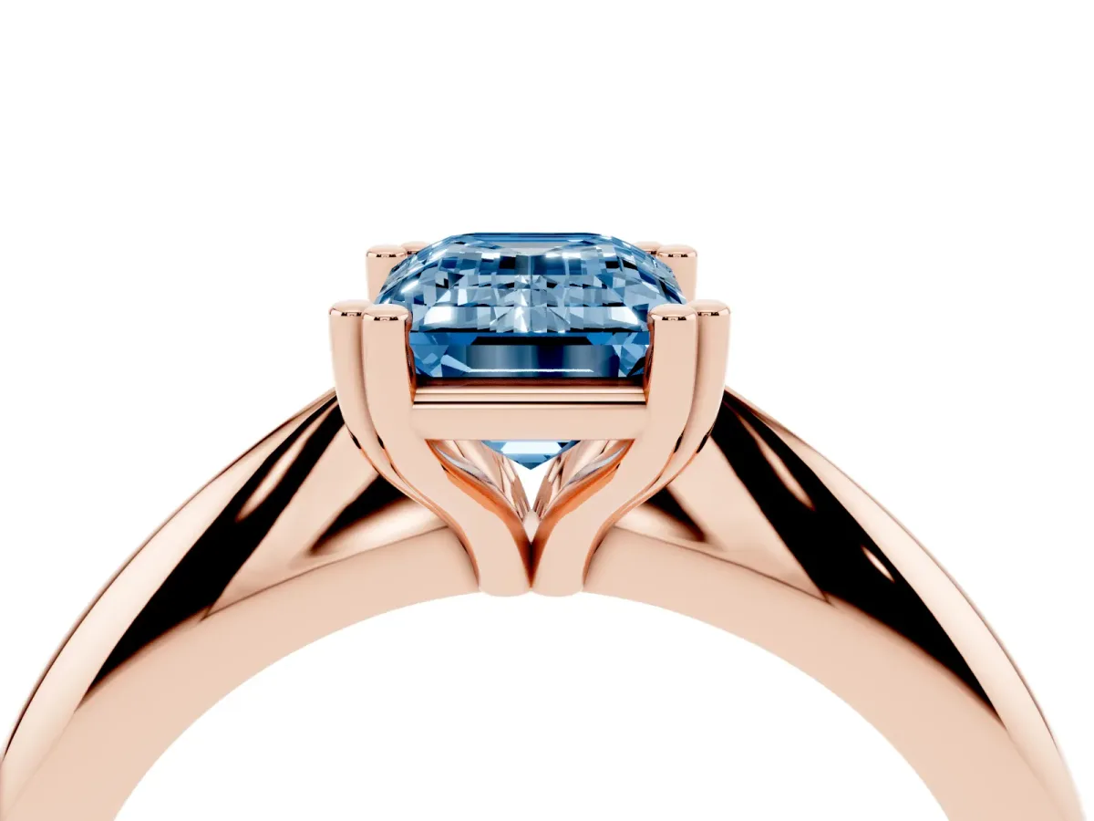 Fancy Blue Emerald Cut Cut Solitaire Engagement Ring with Tapered Band and Four-Prong Setting Rose gold