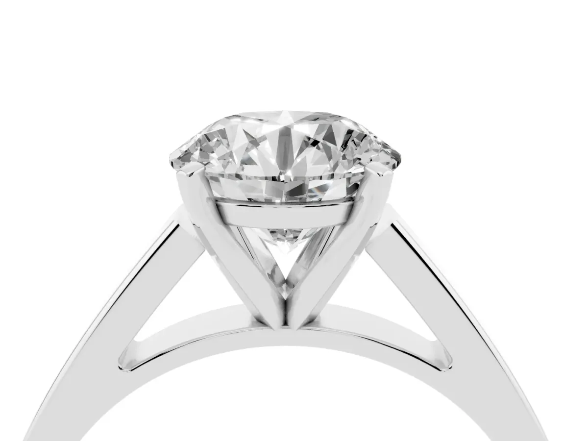 Round Cut Solitaire Engagement Ring with Four-Prong Setting and Tapered Band White gold