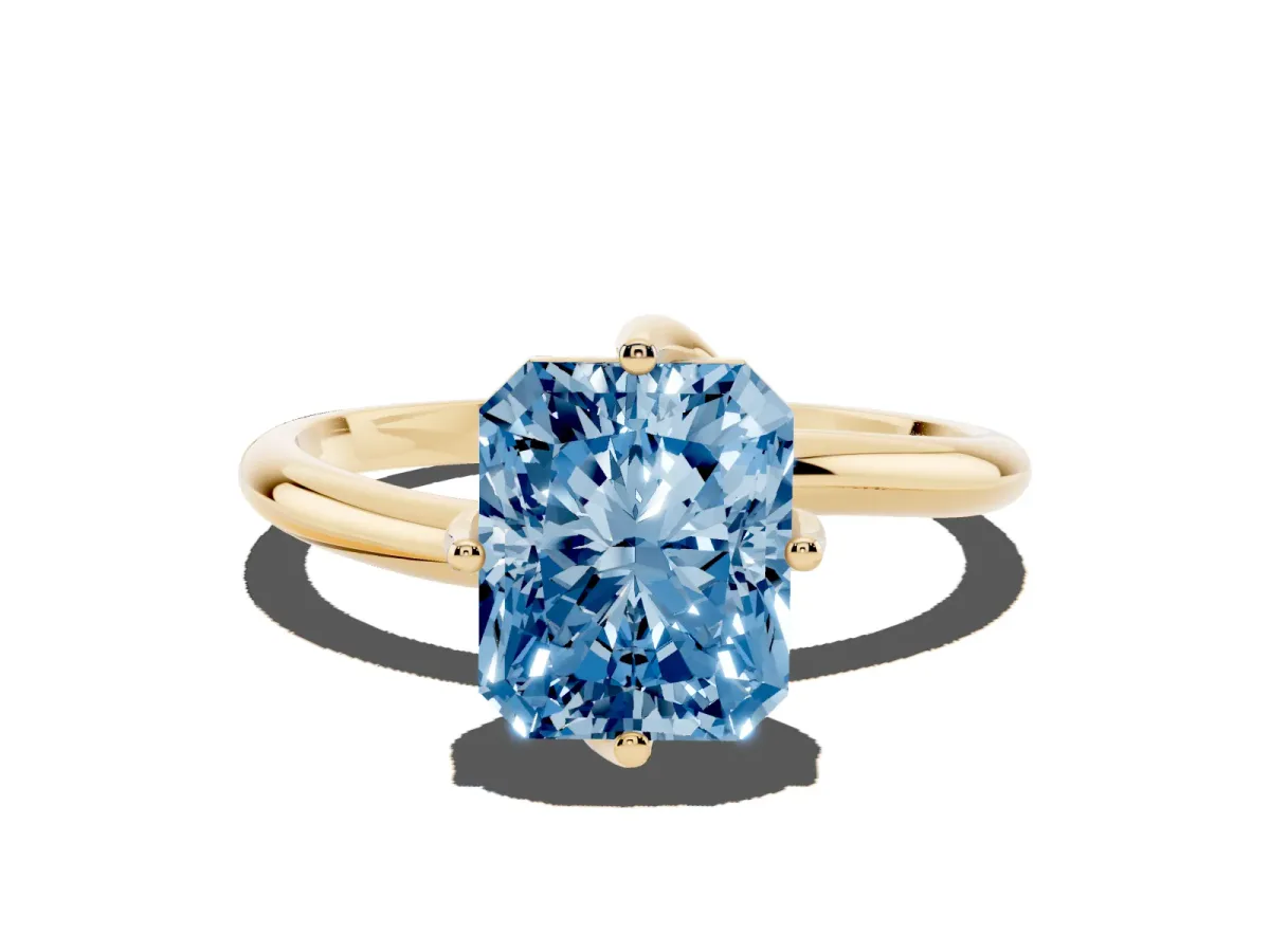 Fancy Blue Radiant Cut Diamond Solitaire Engagement Ring with Four-Prong Setting and Classic Band Yellow gold