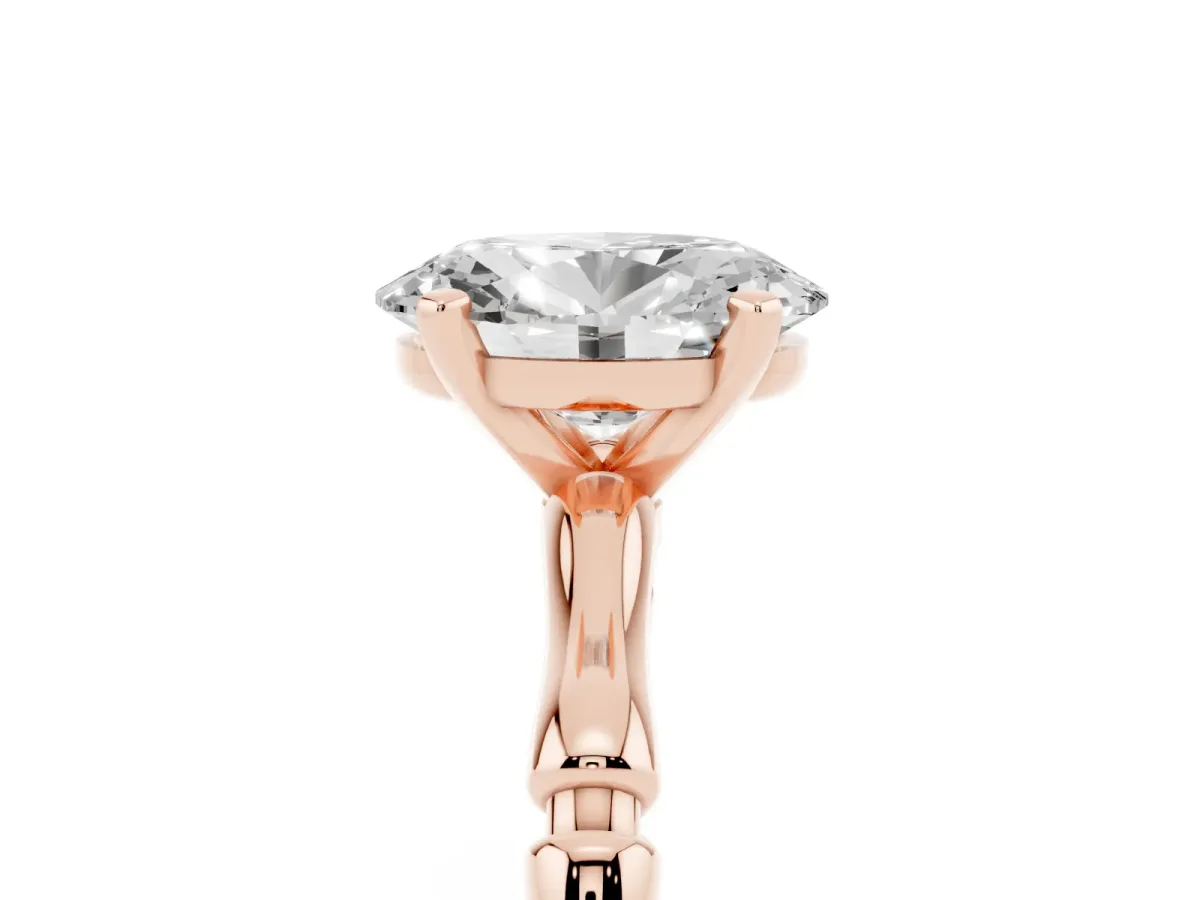 Oval Cut Solitaire Diamond Ring with Bamboo Band and Four-Prong Setting Rose gold
