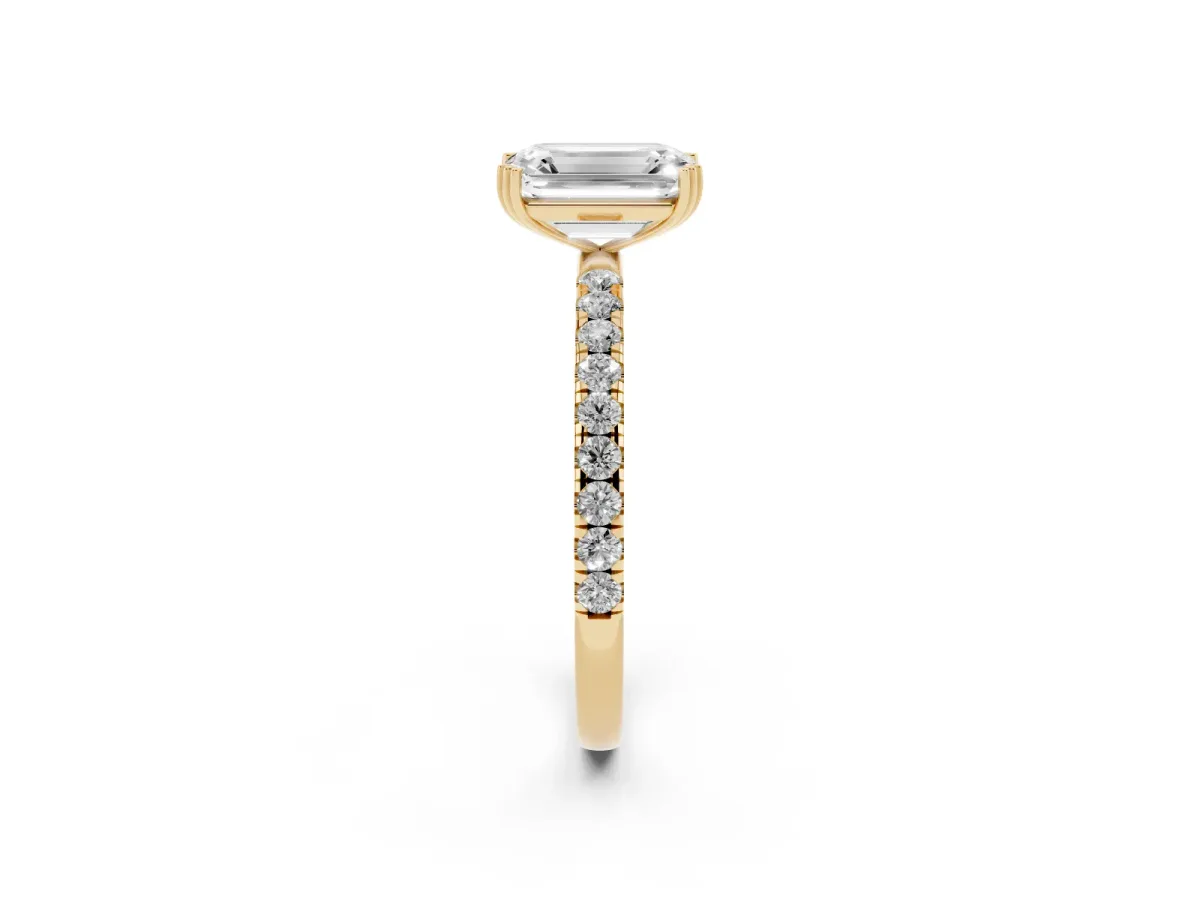 Emerald Cut Brilliant Solitaire with Pavé Band and Claw Prong Setting Yellow gold