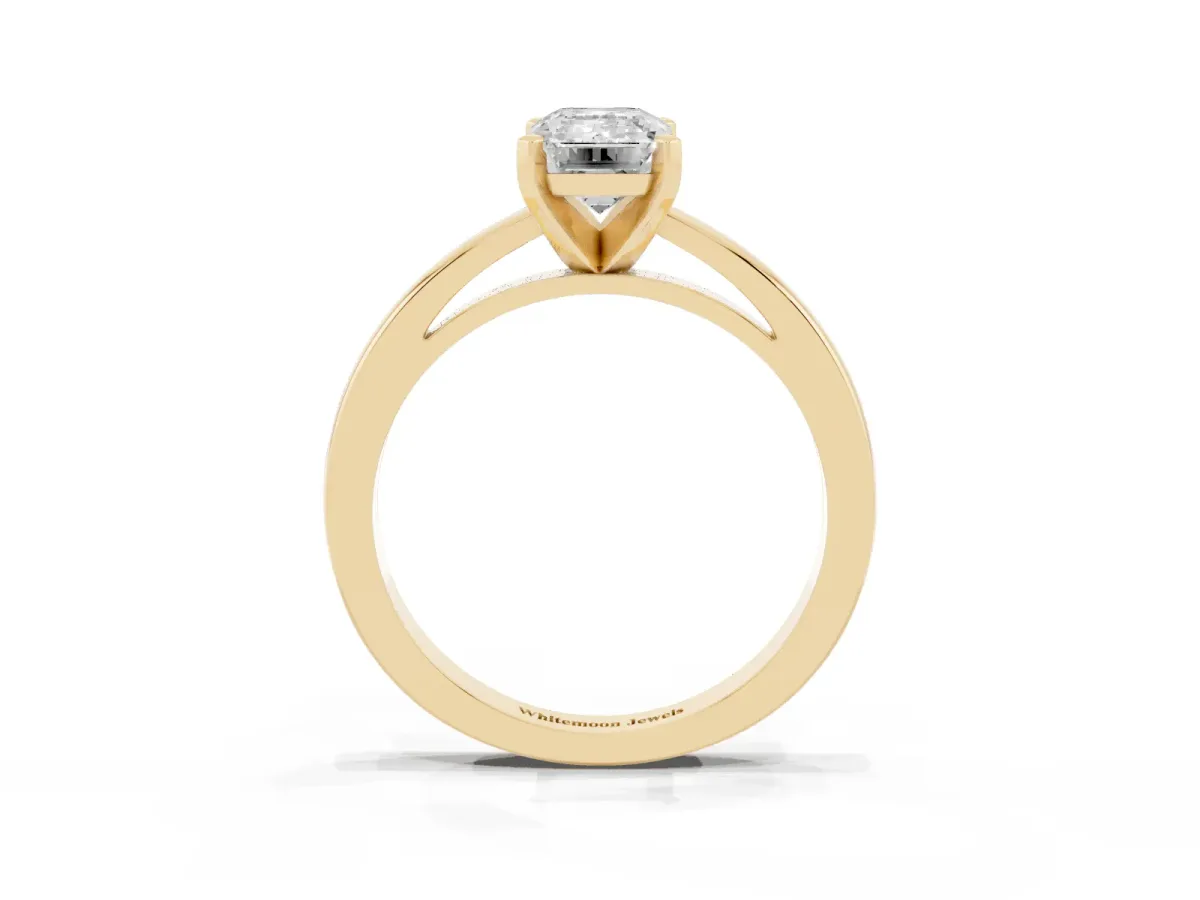 Emerald Cut Solitaire Diamond Engagement Ring with Four-Prong Setting on a Classic Band Yellow gold