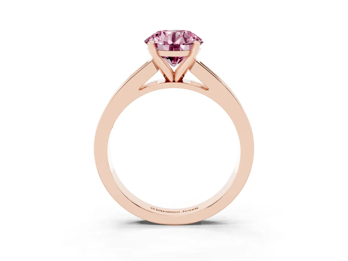 Fancy Pink Round Cut Solitaire Diamond Ring with Channel-Set Band and Four-Prong Setting Rose gold