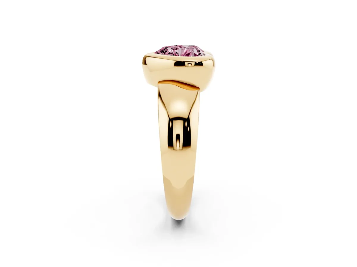 Fancy Pink Bezel Set Heart Cut Solitaire Ring with Wide Band Yellow gold