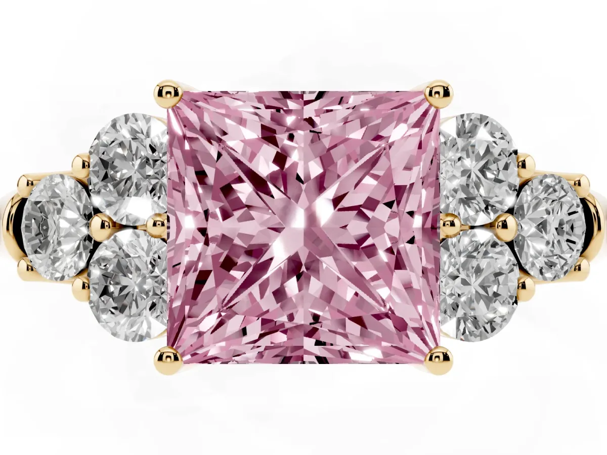 Fancy Pink Princess Cut Cut Diamond Cluster Ring with Round Accent Stones and Prong Setting on a Classic Band Yellow gold