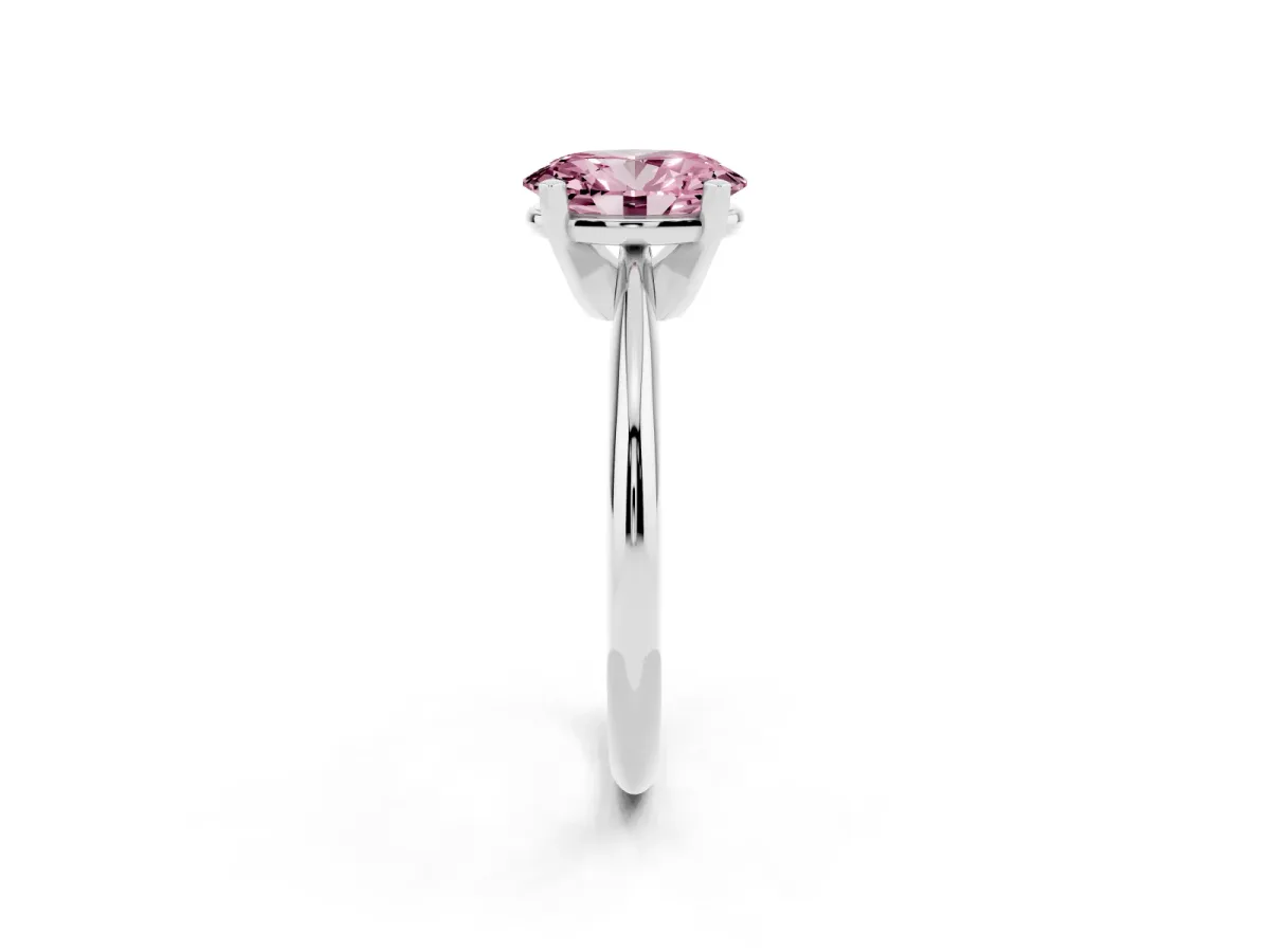 Fancy Pink Oval Cut Cut Solitaire Ring with Four-Prong Setting on a Classic Band Silver