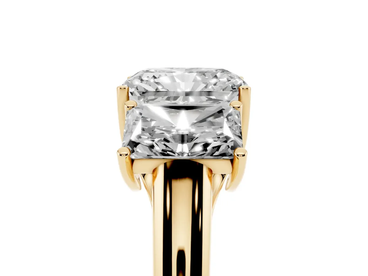 Three-Stone Radiant Cut Diamond Engagement Ring with Prong Setting Yellow gold