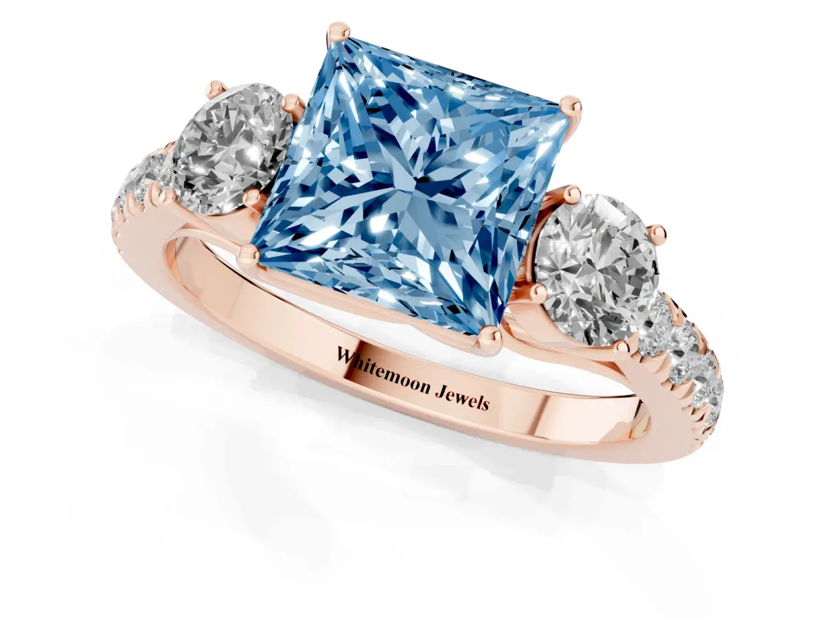Fancy Blue Princess Cut Cut Diamond Three-Stone Ring with Round Side Stones and Pavé Band Rose gold