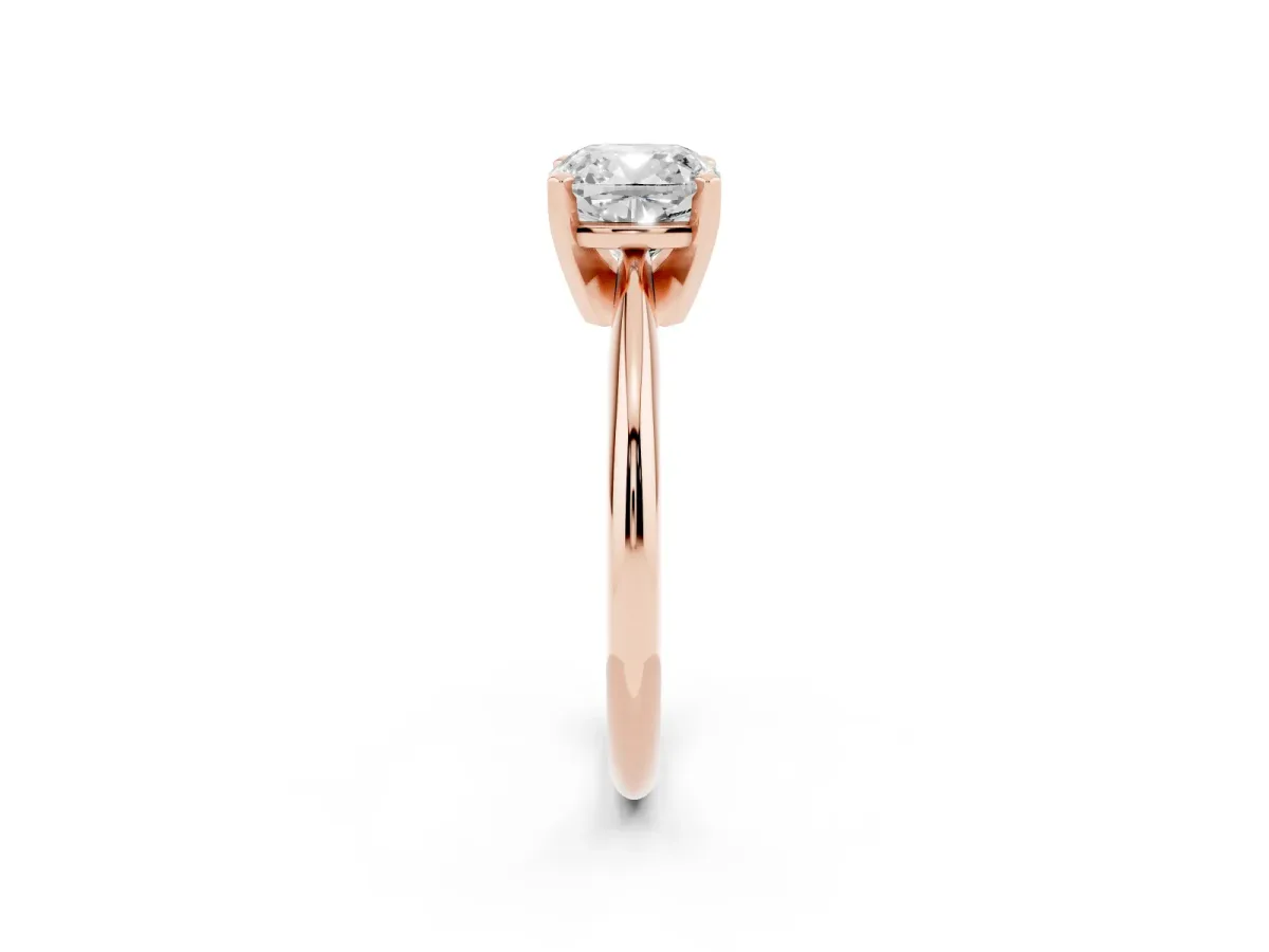 Cushion Cut Cut Solitaire Ring with Four-Prong Setting on a Classic Band Rose gold