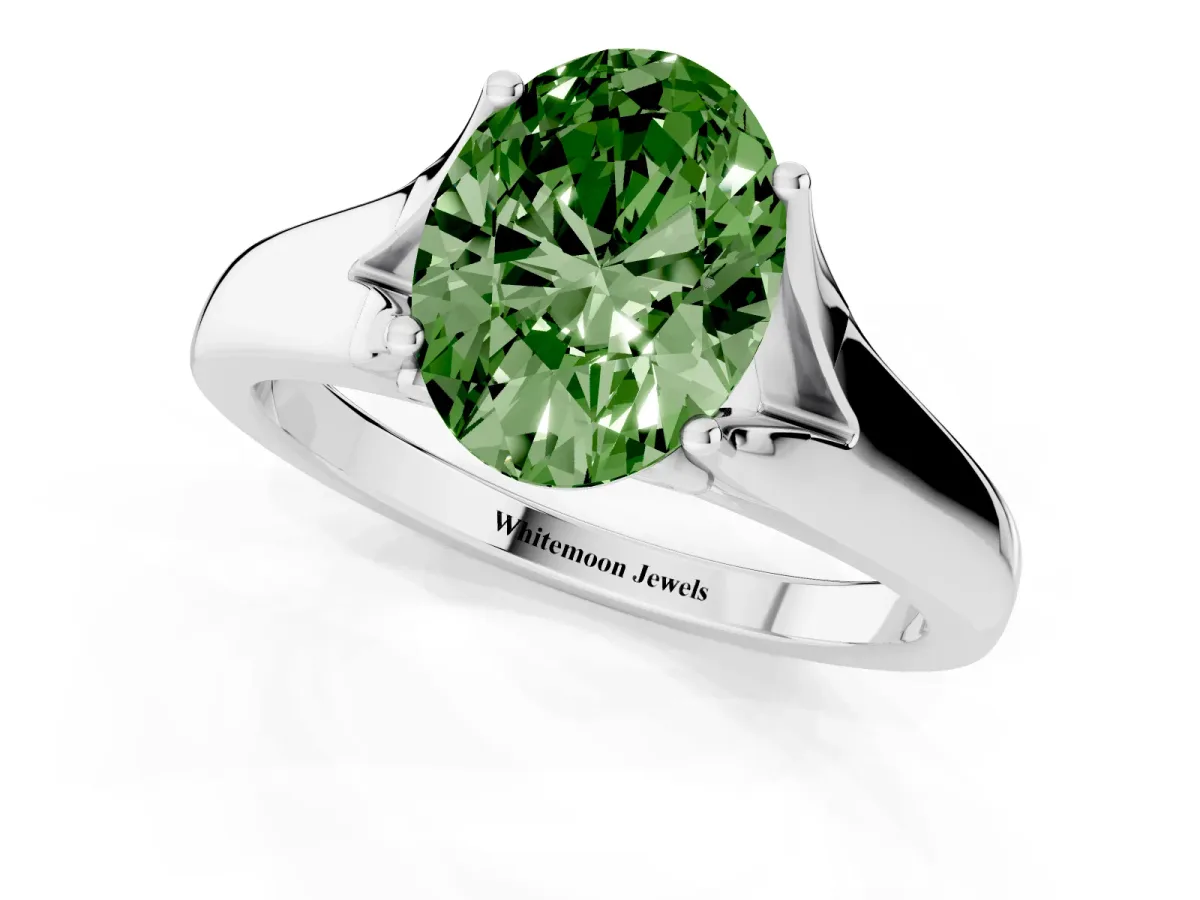 Fancy Green Oval Cut Solitaire Diamond Ring with Cathedral Band and Four-Prong Setting Silver