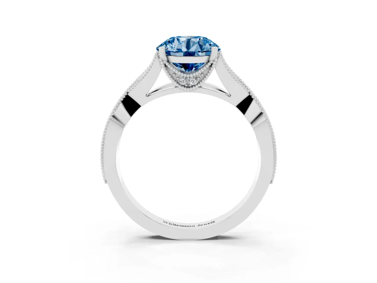 Fancy Blue Round Cut Cut Diamond Twisted Band with Milgrain Pave Setting and Four-Prong Setting Silver