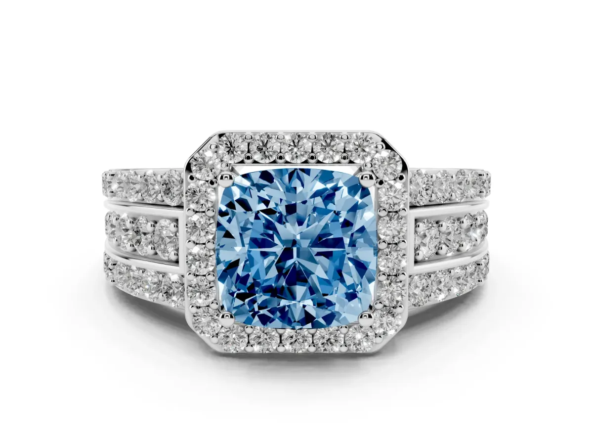 Fancy Blue Cushion Cut Halo Diamond Ring with Round Split Shank and Prong Setting Platinum